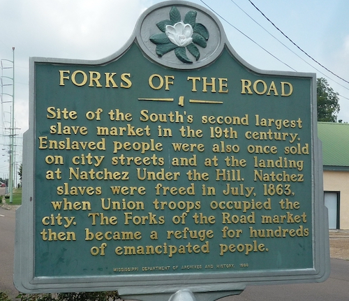 Forks of the Road historical marker at the intersection of Liberty Road, St. Catherine Street, and Devereaux Drive, Natchez, MS. Courtesy of The Historical Marker Database, https://www.hmdb.org. 